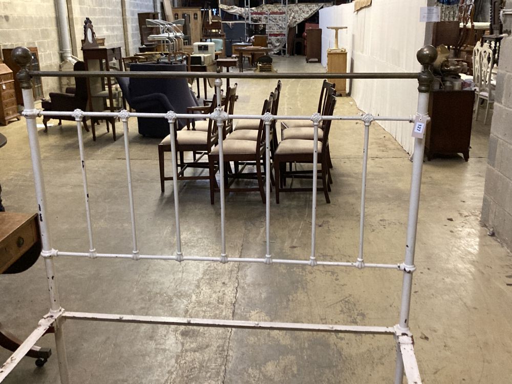 A late Victorian iron and brass double bed frame, width 54cm height 141cm